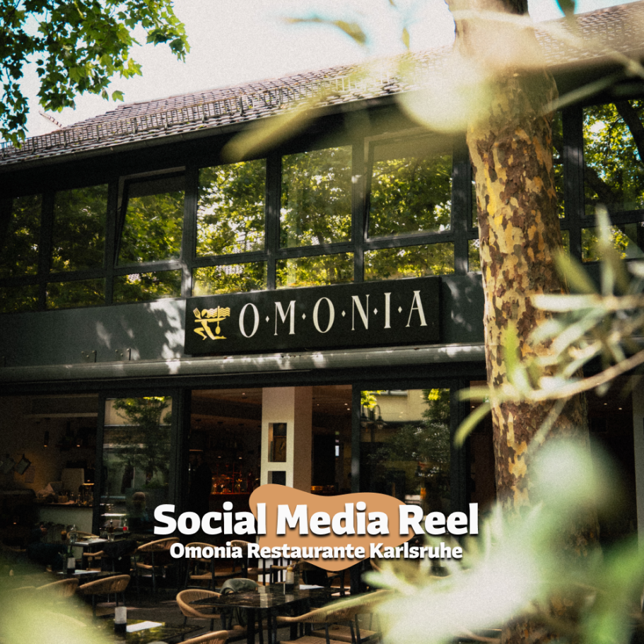 Restaurant Omonia in Karlsruhe mit Außenansicht und sozialen Medien Hinweis.